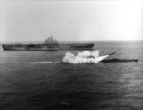 USS_Halibut_(SSGN-587)_firing_a_Regulus_missile_next_to_USS_Lexington_(CV-16),_25_March_1960